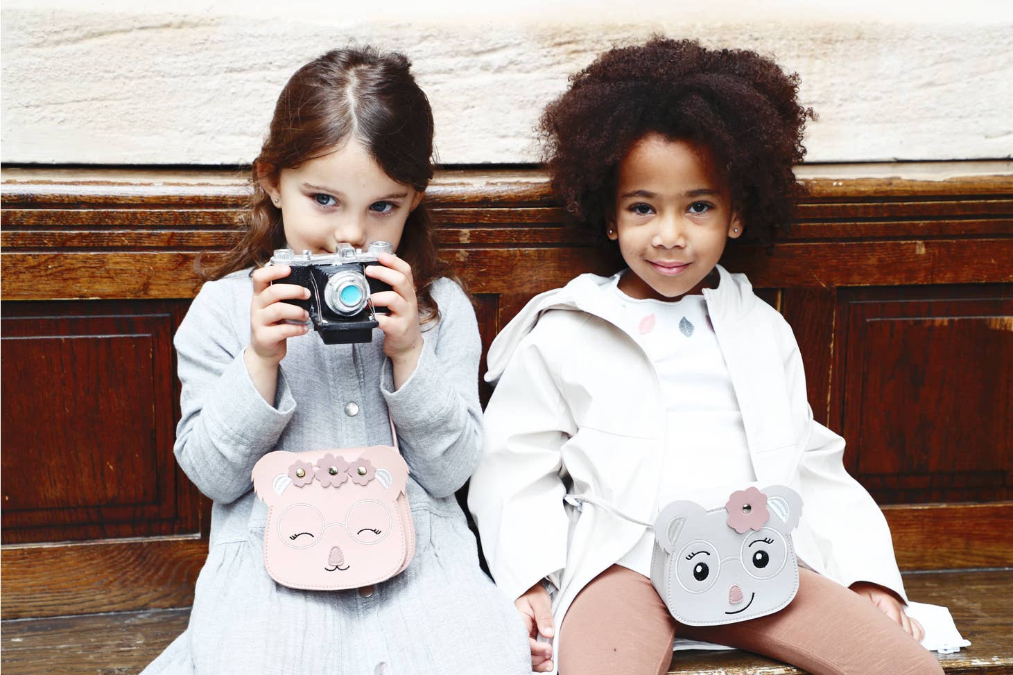 The child on sale crossbody bag